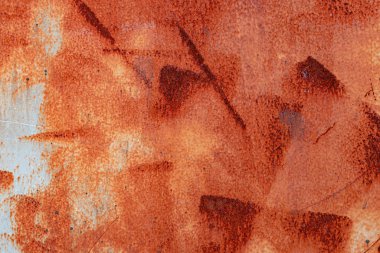 Soyut bir arkaplan olarak paslı metal dokusu.