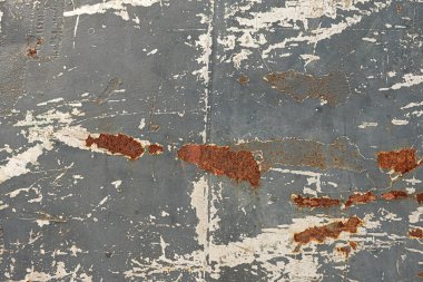 Soyut bir arkaplan olarak duvardaki eski soyulmuş boya..