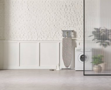 Washing machine in the bathroom, white brick wall background, vase of plant, cabinet and marble floor, folding screen.