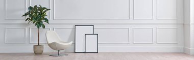 White classic wall background, brown parquet floor, home furniture detail, frame and vase of plant.