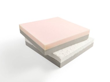 İzole edilmiş beyaz arkaplanda yatak yatağı süngeri bölümü.