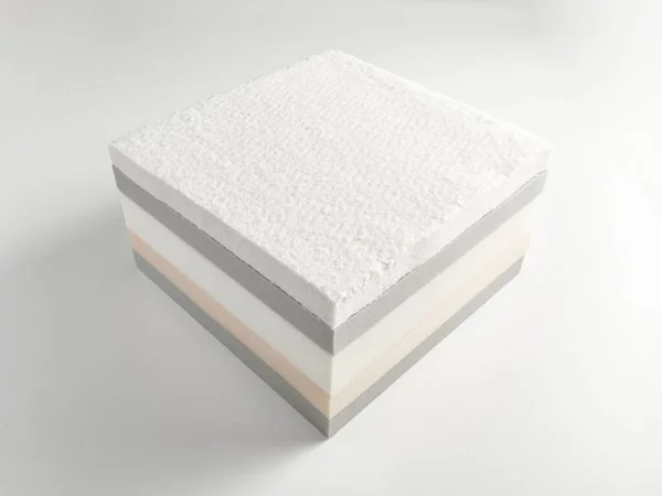 孤立的白色背景上的床垫床海绵部分 — 图库照片