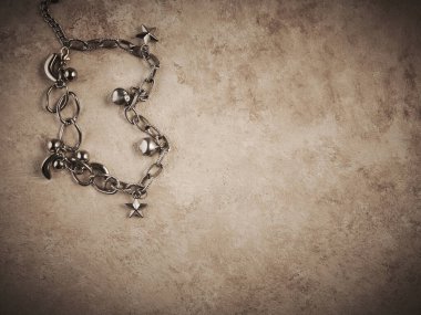 Elegant jewelry set ring, necklace and earrings with diamonds.Product still life concept. Modern and decorative textured background.