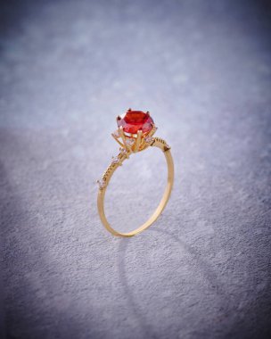 Elegant jewelry set ring, necklace and earrings with diamonds.Product still life concept. Modern and decorative textured background.