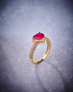 Elegant jewelry set ring, necklace and earrings with diamonds.Product still life concept. Modern and decorative textured background.