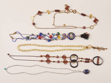 Elegant jewelry set ring, necklace and earrings with diamonds.Product still life concept. Modern and decorative white background. Isolated.