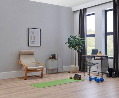 Modern oda spor tarzı, paspas, dambıl ve bisiklet.