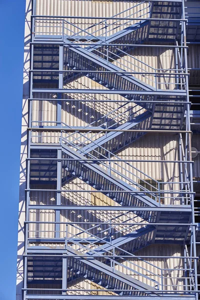 Exterior factory ladder, iron material.