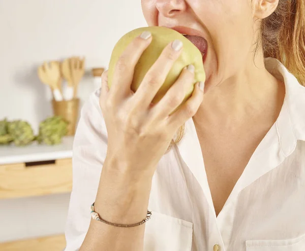 Woman Eating Apple Close Mouth Hand Kitchen Background Style — Stock Photo, Image