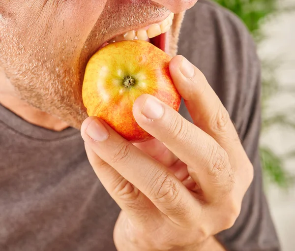 Close Mouth Man Eating Red Apple Style Kitchen Background — Stock Photo, Image