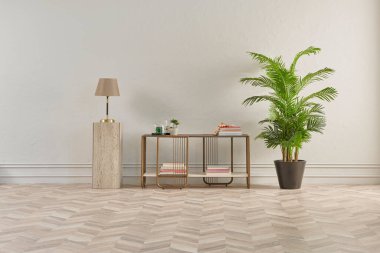 Bu dingin oturma odasında minimalist bir tasarım var. Ringa sandalyesi, yuvarlak halı, konsol masası ve soyut sanat eserleri var. Hepsi klasik beyaz duvarlara ve ringa kemiği zeminine karşı..