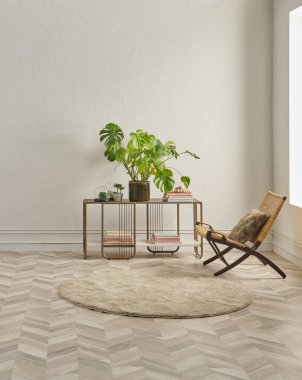 Bu dingin oturma odasında minimalist bir tasarım var. Ringa sandalyesi, yuvarlak halı, konsol masası ve soyut sanat eserleri var. Hepsi klasik beyaz duvarlara ve ringa kemiği zeminine karşı..