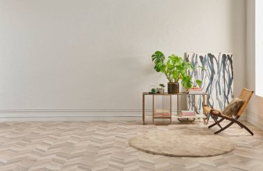 Bu dingin oturma odasında minimalist bir tasarım var. Ringa sandalyesi, yuvarlak halı, konsol masası ve soyut sanat eserleri var. Hepsi klasik beyaz duvarlara ve ringa kemiği zeminine karşı..