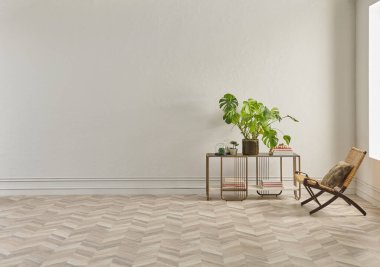 Bu dingin oturma odasında minimalist bir tasarım var. Ringa sandalyesi, yuvarlak halı, konsol masası ve soyut sanat eserleri var. Hepsi klasik beyaz duvarlara ve ringa kemiği zeminine karşı..