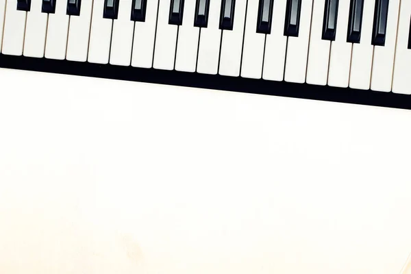 Musical Synthesizer Piano Keys White Surface Text — Stock Photo, Image
