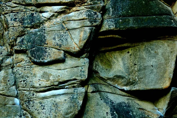 石层岩石黑暗墙的背景 — 图库照片