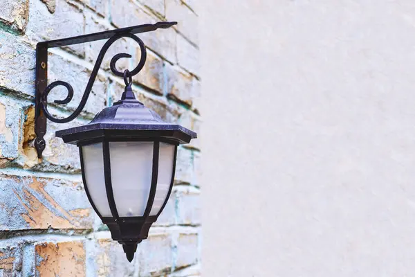 Brick wall with vintage street lamps lanterns.Place for text