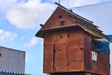 Old rusty dovecote for keeping and breeding pigeons clipart