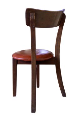 Wooden chair with  leather cushion isolated on white background work with clipping path. View from the side offset to the back
