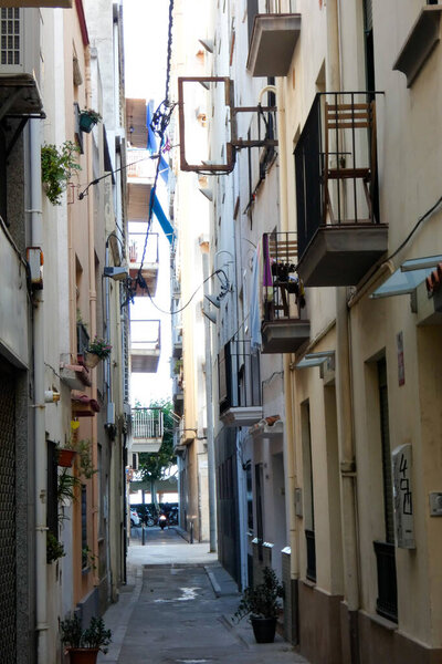 Narrow streets in the old quarter of the Mediterranean town of Blanes in the province of Barcelona, Catalonia, Spain.