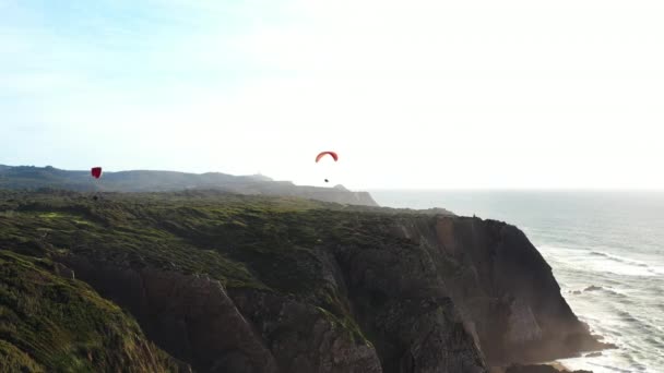 Extreme Paraglider Flying Clear Blue Skies Cinematic Teal Ocean Unrecognizable — Stock Video