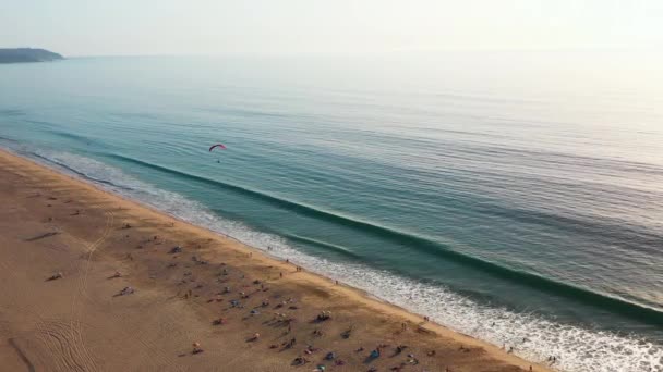 Aerial Drone Shot Unrecognizable Person Flies Paraglide Sea Beach Tourist — Stock Video