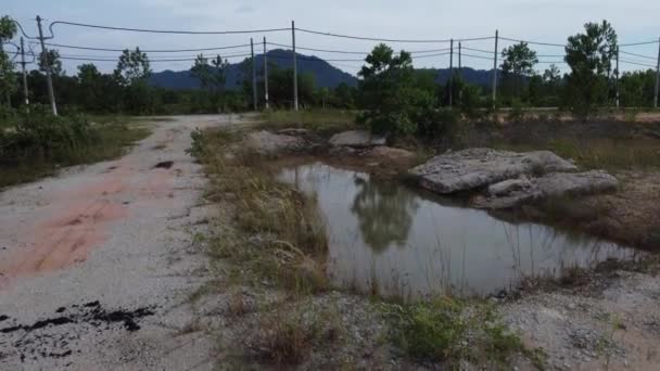 Big Pothole Puddle Isolated Vacant Land — Stock Video
