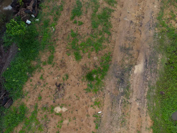 aerial scene of the vacant agriculture land fulls of puddle