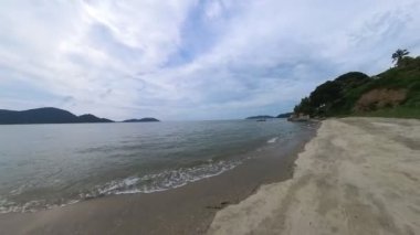 motion footage of walking along the beach