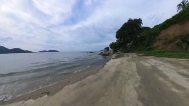 motion footage of walking along the beach