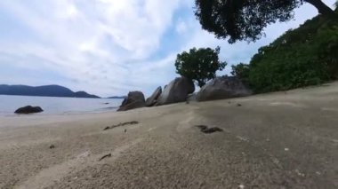 motion footage of walking along the beach