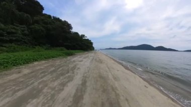 motion footage of walking along the beach