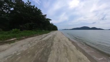 motion footage of walking along the beach