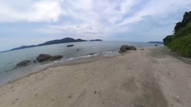 motion footage of walking along the beach