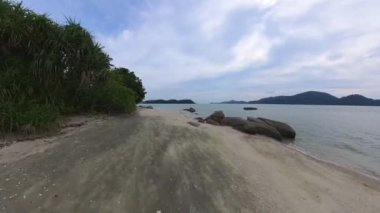 motion footage of walking along the beach