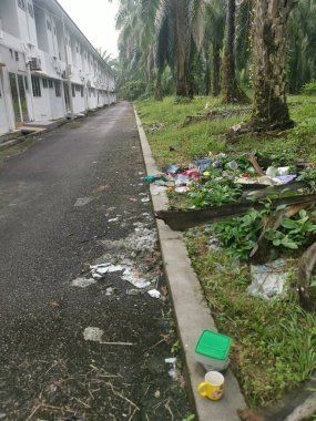 Perak,Malaysia. January 25,2023:Illegal and irresponsible dumping of domestic waste materials along the bushy roadside at Taman Mas 1,Kg Koh.
