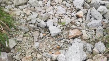 pile of broken granite stone on the outdoor farm.