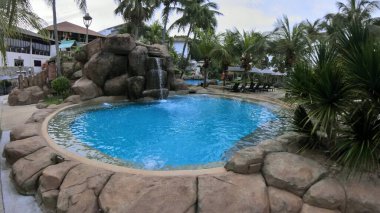 Perak, Malaysia. January 30,2023: Scene of the quiet water park playground around the outdoor recreational area at DoubleTree Hilton Resort at Damar laut. 