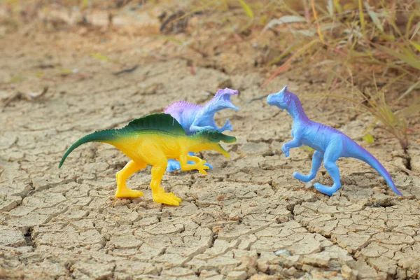 infrared image of the dinosaur toys illustrating loitering around the dried land.