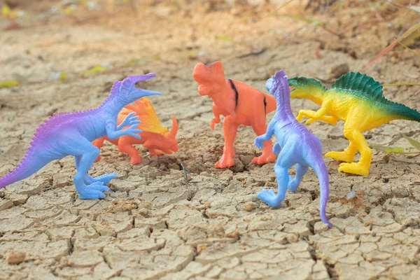 infrared image of the dinosaur toys illustrating loitering around the dried land.
