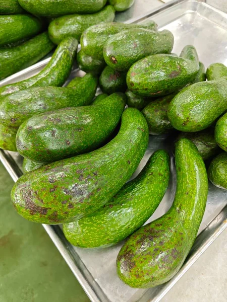 Sale Many Long Pear Shaped Avocado Fruit — Stock Photo, Image