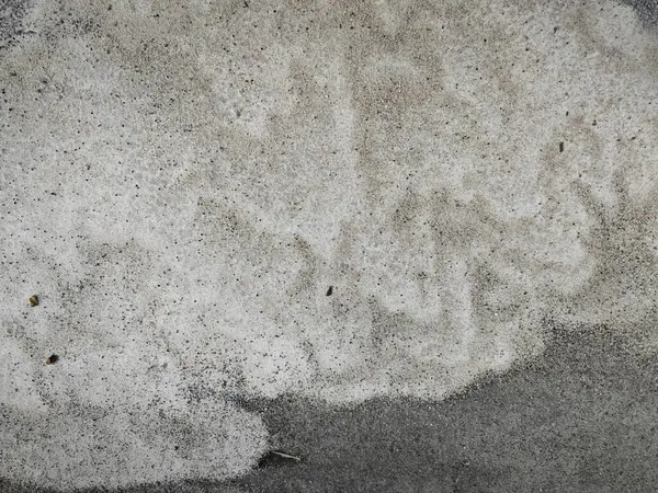 アスファルト道路の表面にある砂 — ストック写真