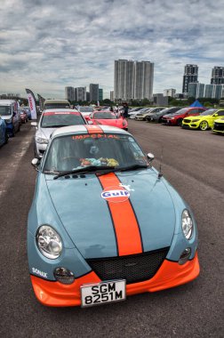 Kuala Lumpur, Malezya - 02 Aralık 2023: Retro Havoc Festivali 'nde popüler klasik araba ve bisiklet sergisi sahnesi, Sınırsız Baskı, Sg Besi. 
