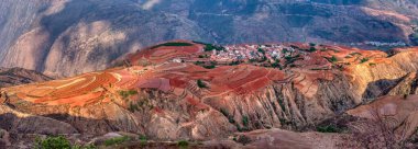 the beautiful mountainous agriculture terraced fields landscape of Dongchuan. clipart