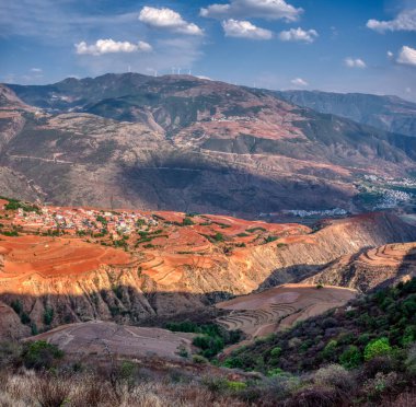 the beautiful mountainous agriculture terraced fields landscape of Dongchuan. clipart