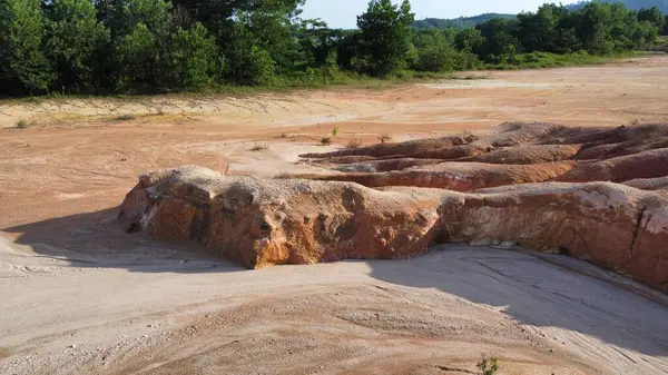 stock image panoramic aerial scene of the deserted vacant land due to deforestation and earth mining.