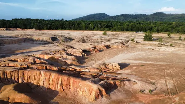 stock image panoramic aerial scene of the deserted vacant land due to deforestation and earth mining.