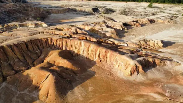 stock image panoramic aerial scene of the deserted vacant land due to deforestation and earth mining.