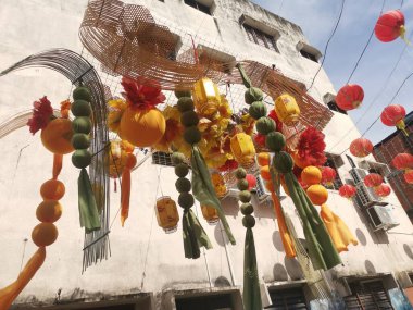 Perak,Malaysia. January 27,2024:Colorful decoration scene walking along the Sitiawan cultural lane at Kg Koh old market Street. clipart