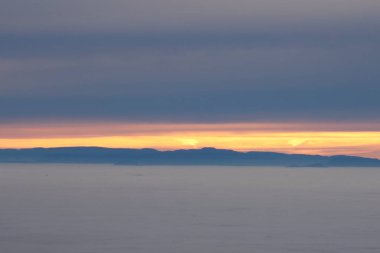 sunset over the vosges, seen from a black forest hill